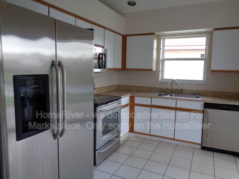 Lakefront Living in Gated Newport Cove | 3BR + 2-Car Garage property image